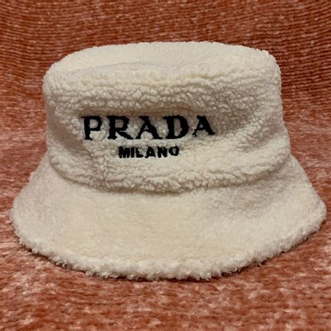 red prada visor|Prada bucket hat sherpa.